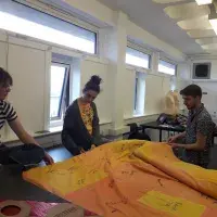 HiSS This is us artists with coat 1