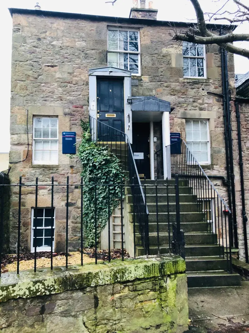 The entrance to Hope Park Counselling Centre is shown, with two parallel doorways that are at the top of an external staircase leading up to them. 