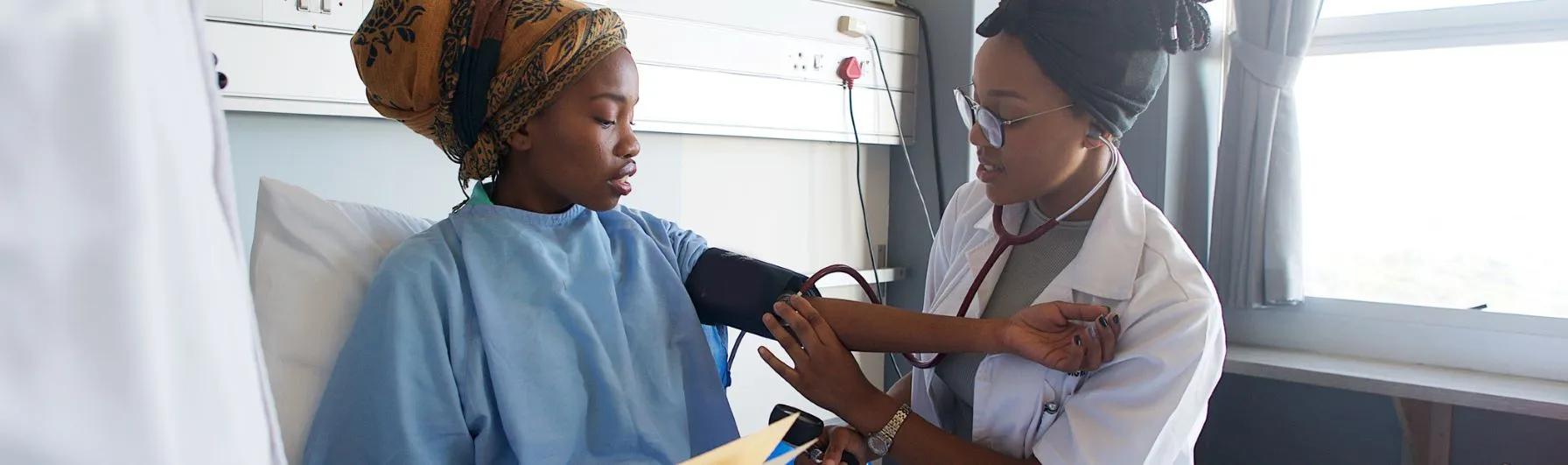 Patient in hospital with nurse"