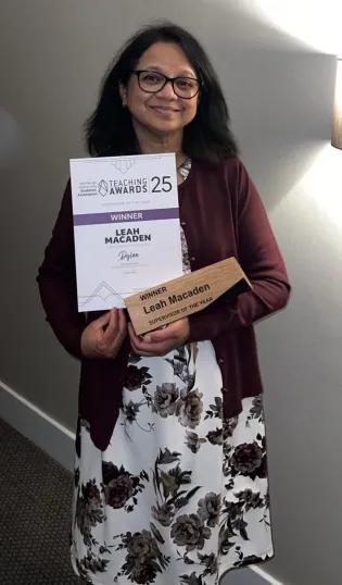 Dr Leah Macaden with her award certificate 